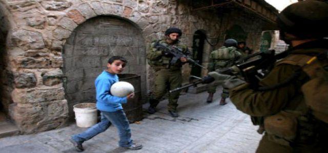 IOF soldiers force Palestinian child to drink sewage water