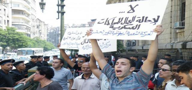 Journalists protest against military trial of workers